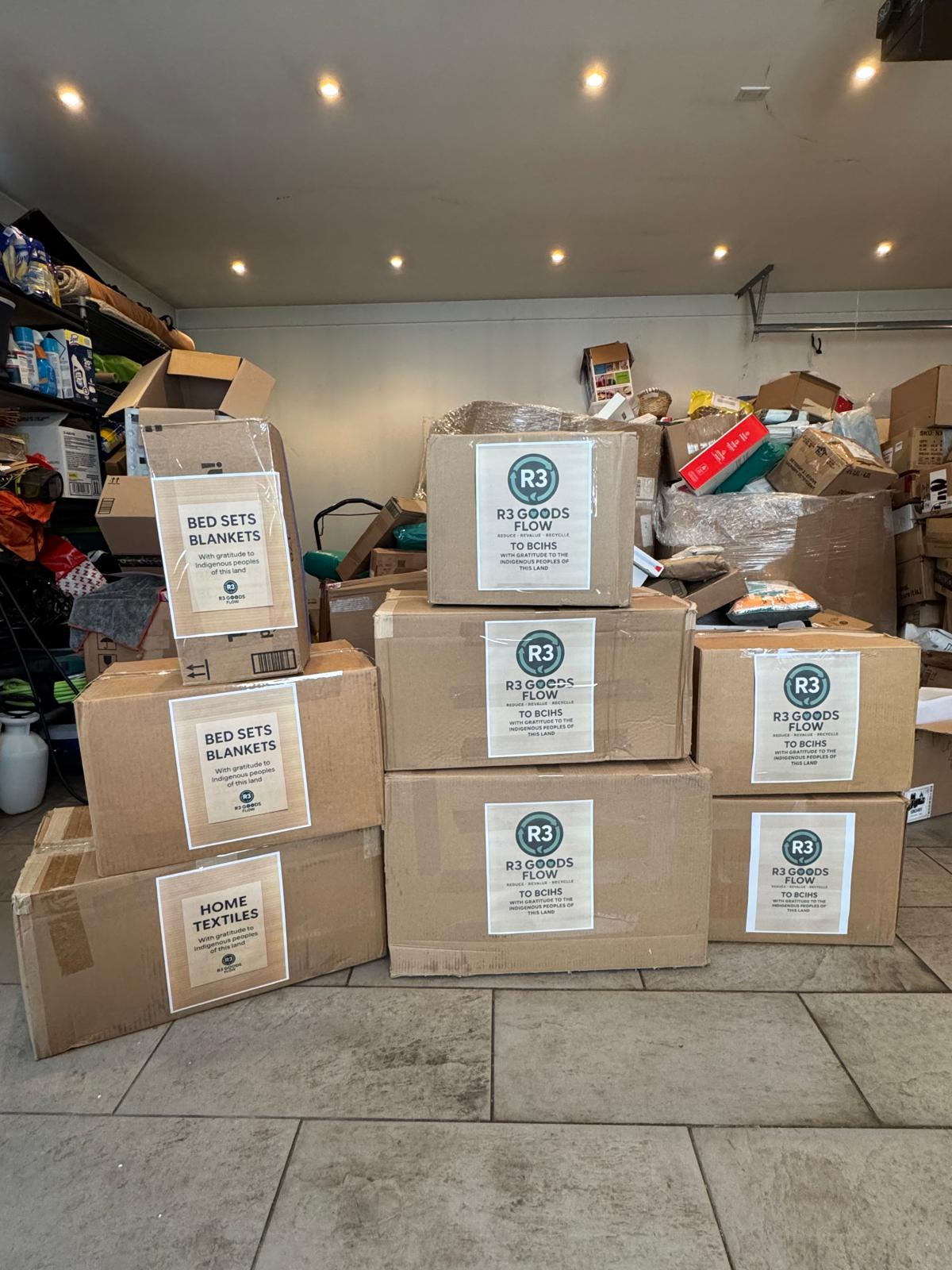 Post-Easter 2026 - Neatly sorted R3 GOODS FLOW boxes labeled for BCIHS