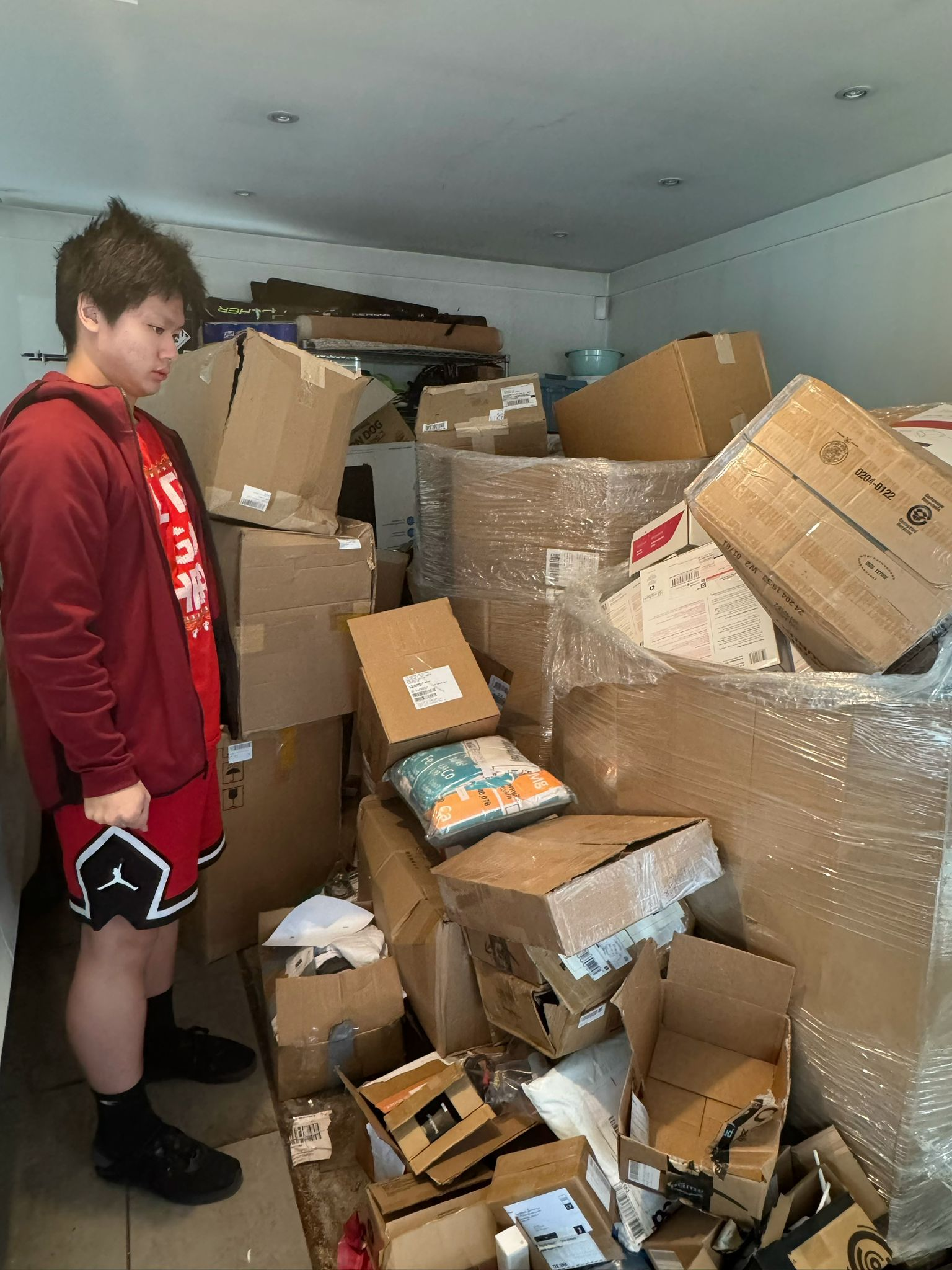 Heading into 2026 Batch - R3 team assessing massive quantity of boxes in garage