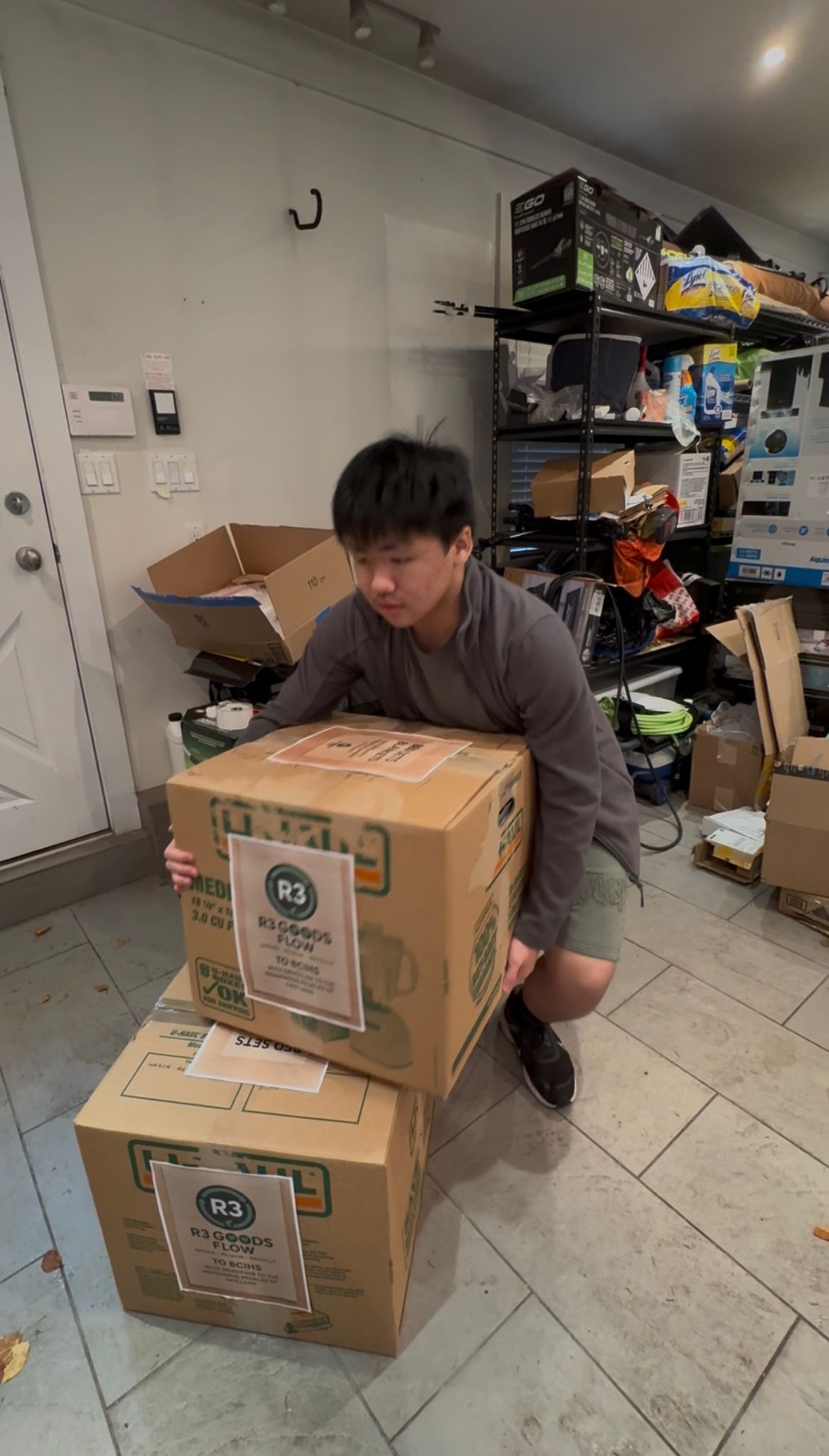 Thanksgiving Donation - Team member carrying labeled donation box