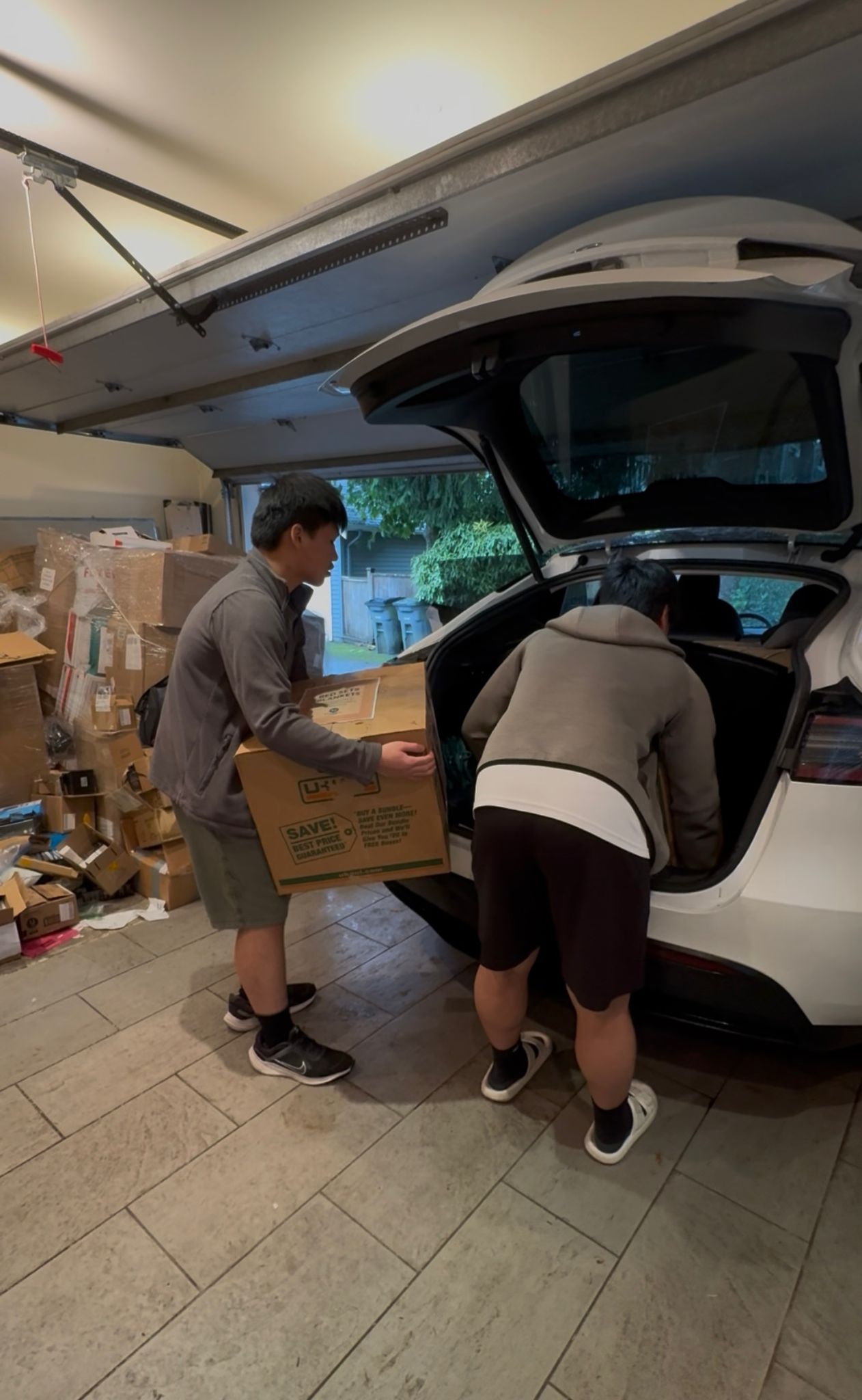 Thanksgiving Donation - Loading supplies into vehicle for BCIHS delivery