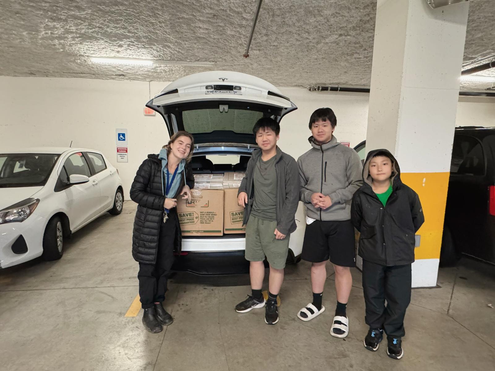 R3 Goods Flow team loading donation boxes for delivery